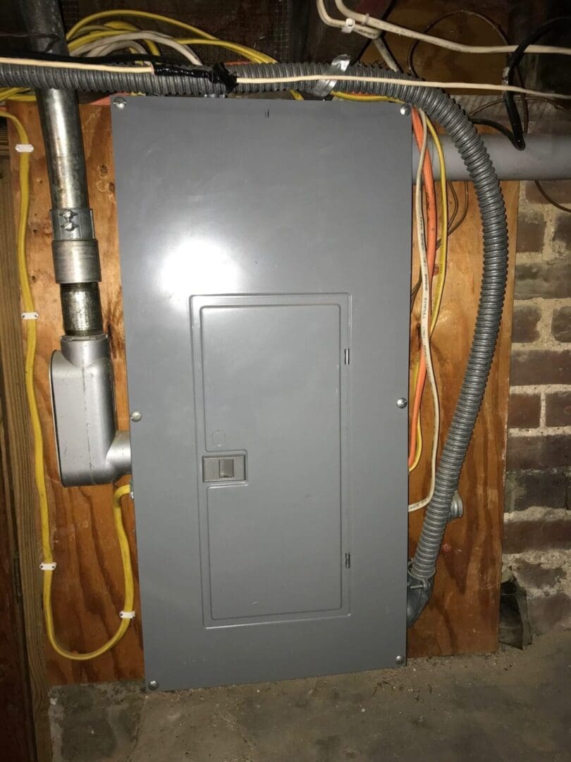 Your Home's Electrical System: A metal box with wires attached to it.