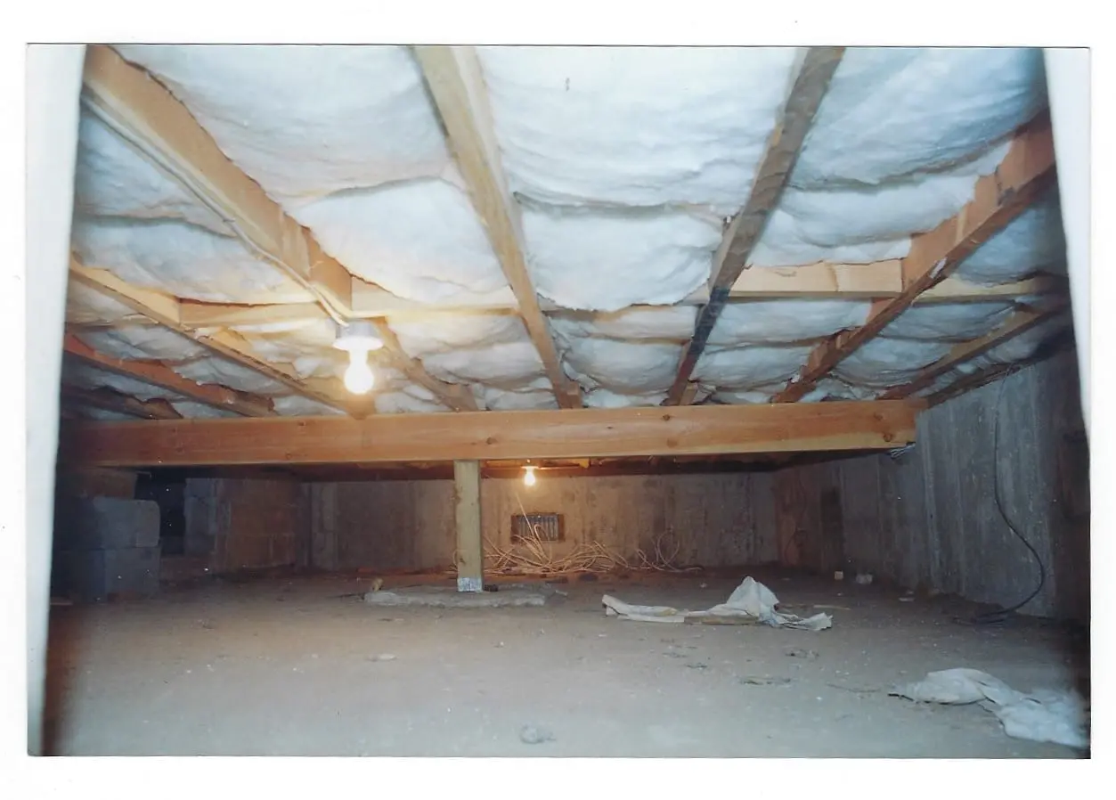 A view of an insulated basement